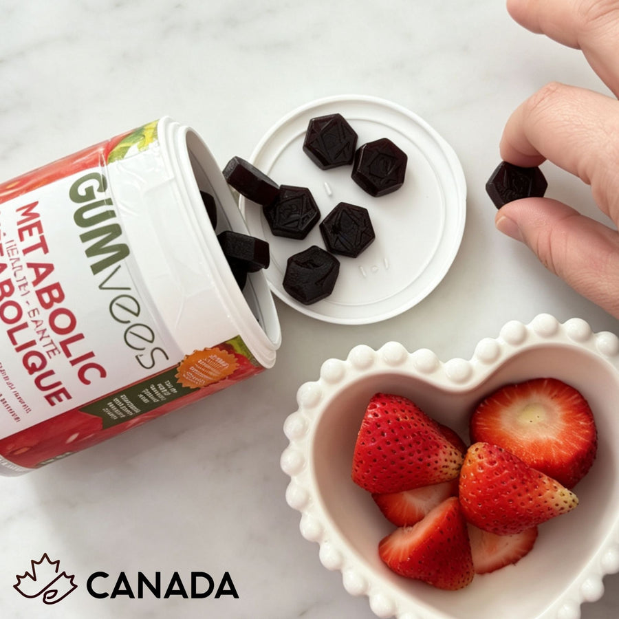 A jar of Strawberries and Cream Metabolic Health Gummies on a counter, gummies on the lid beside a dish of strawberries